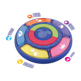 A circular plastic pet training toy with six colored segments labeled for different pet behaviors like 'Friends & Family', 'Loud noises', 'Furries', 'Hums', 'Barks', and 'Animals & Creatures'.